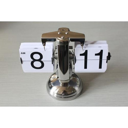 Tasapainovaa'an tyylinen vintage fläppikello