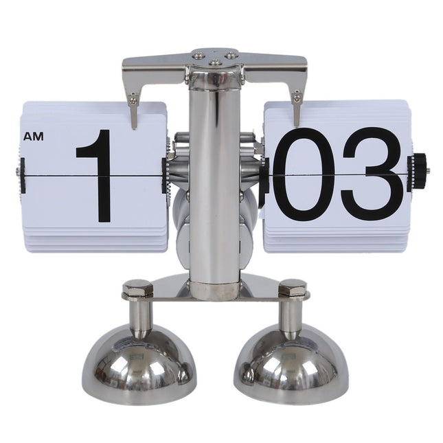 Mekaaninen retro fläppikello metallijalustalla