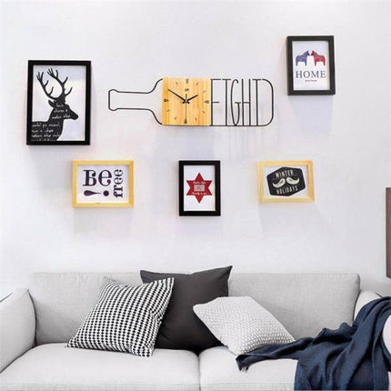 Moderni seinäkello viinipullon muodossa