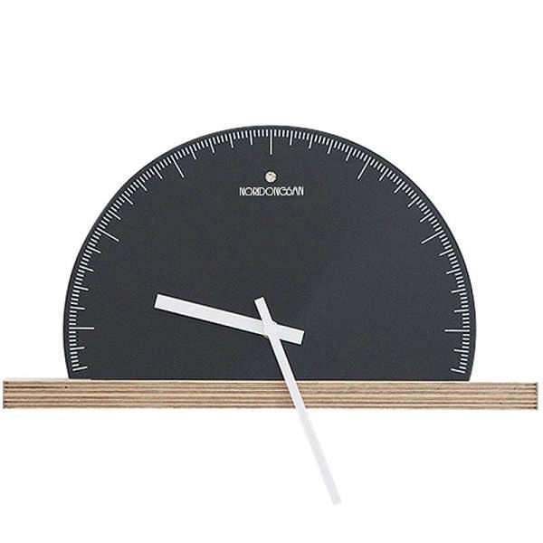 Minimalistinen puolipyöreä design-seinäkello