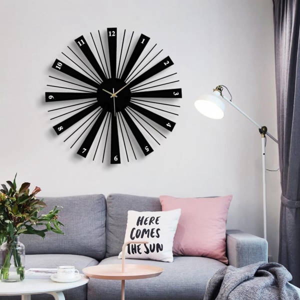 Musta auringonkehrä design-seinäkello