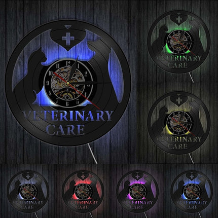Vinyylilevy-seinäkello eläinlääkärin teemalla
