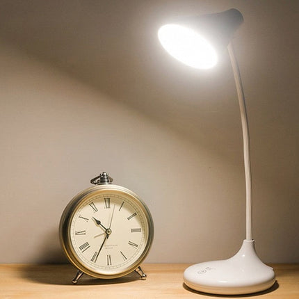 Pyöreä vintage-pöytäkello roomalaisilla numeroilla